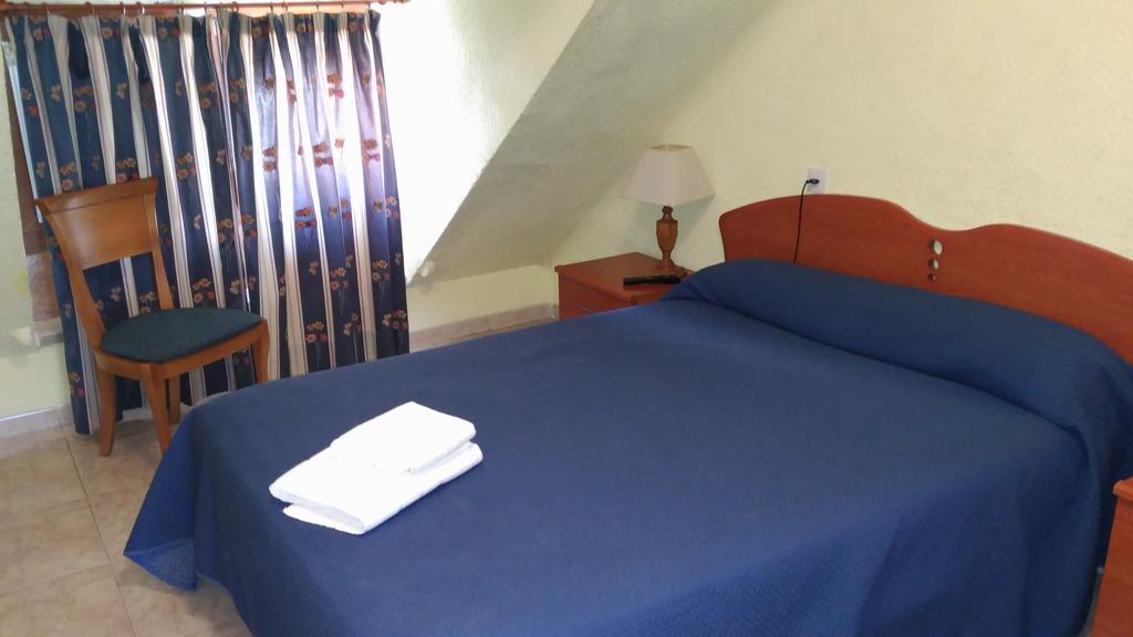 Hostal Aribel Longinos Cercedilla Bagian luar foto